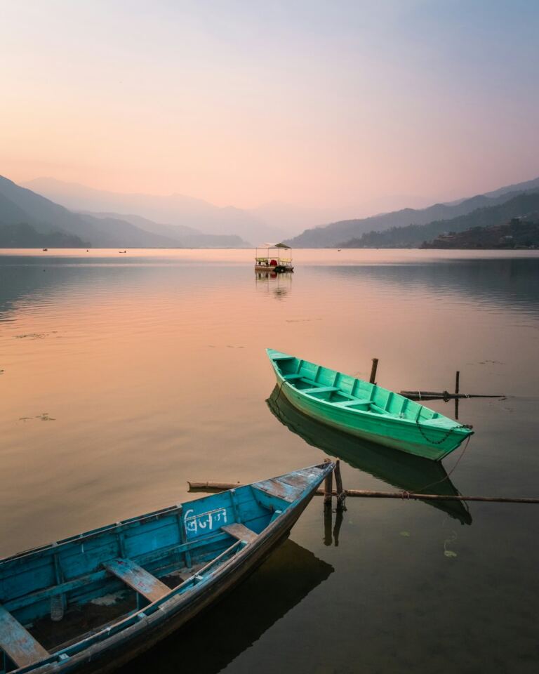 Boats on Phewa Lake in Pokhara, Nepal, one of the major settings associated with Up in the Wind
