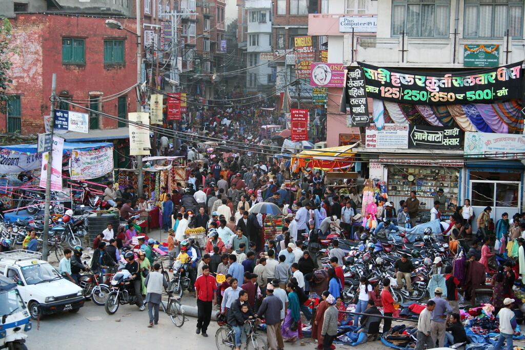 Busy Kathmandu street illustrating everyday urban commerce and living costs