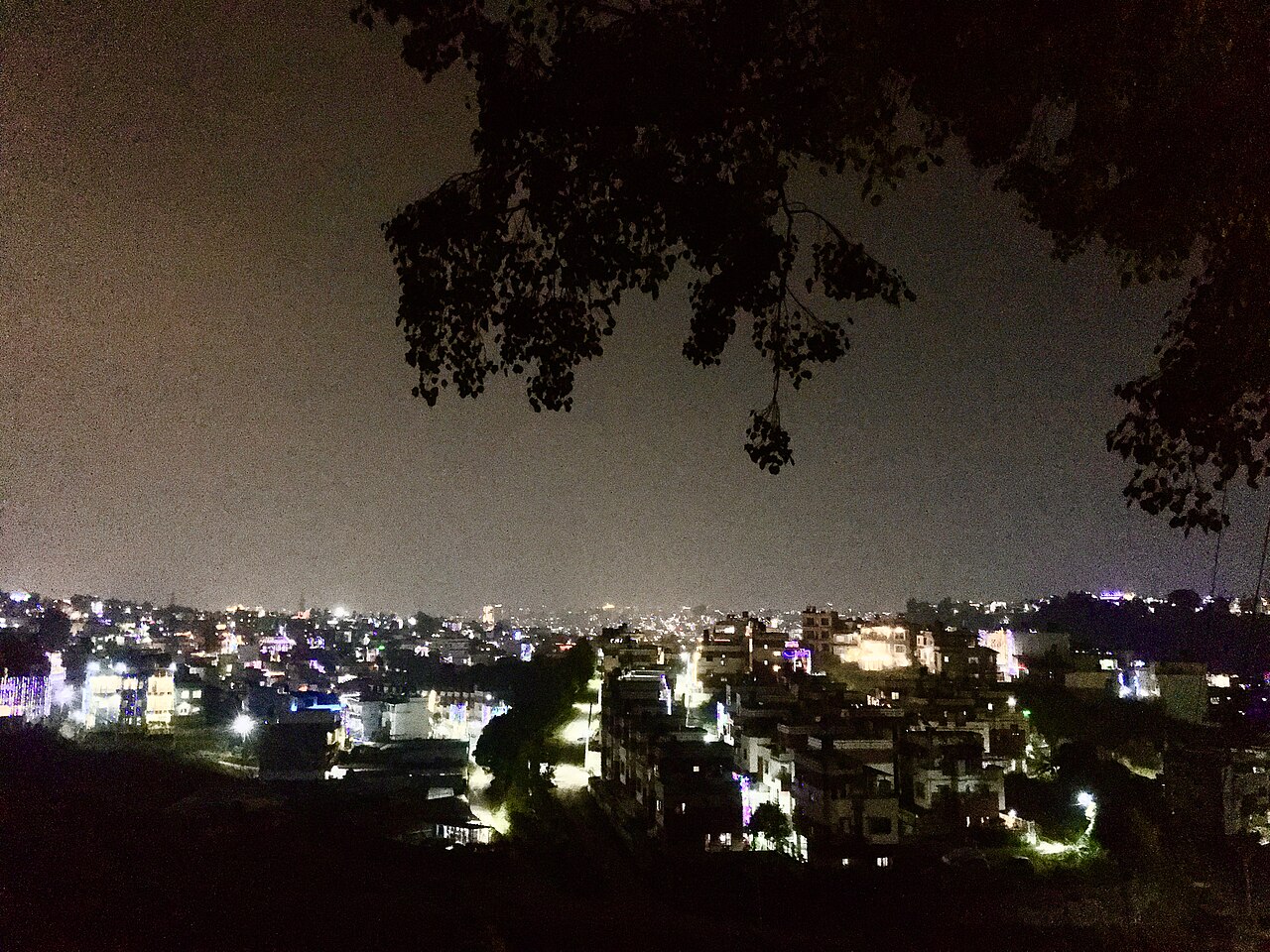 Nepali neighborhood glowing with festive lights during Tihar night