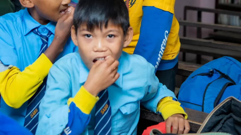 Young boys in a classroom, illustrating students' opportunities to learn in Nepal