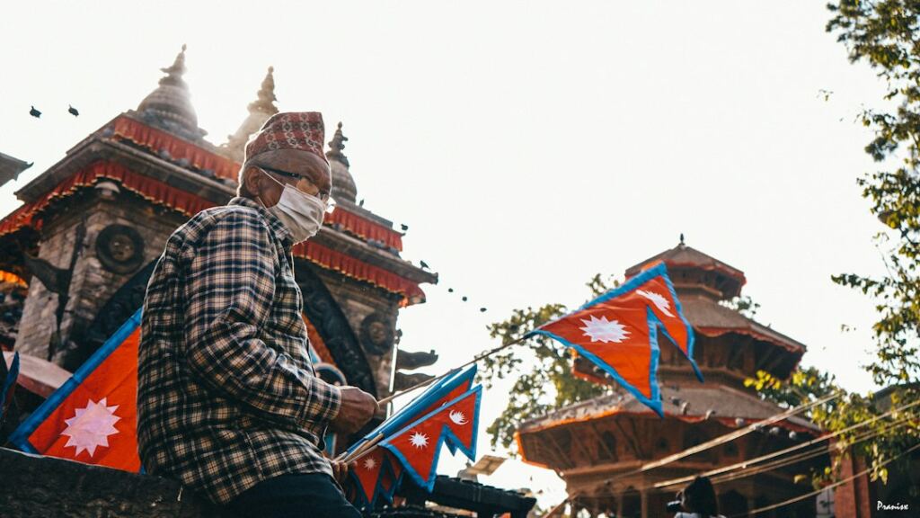 Professional working remotely on a laptop in Nepal